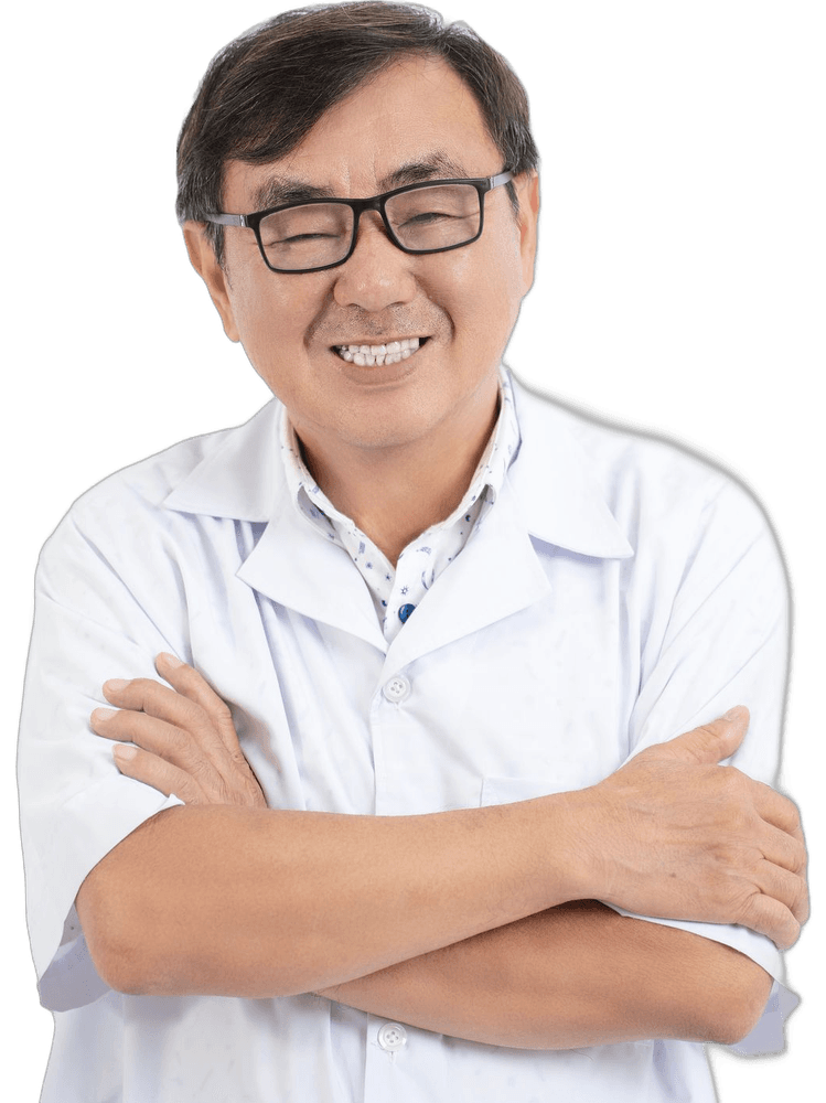 Smiling senior doctor in a white coat with arms crossed