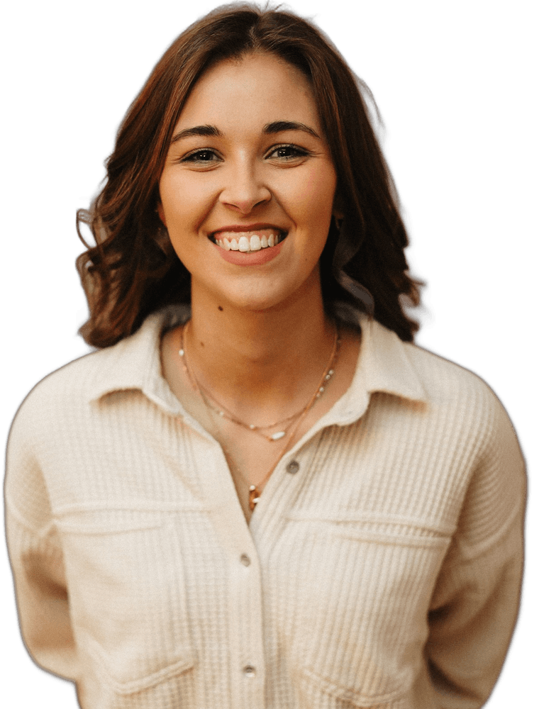 Smiling therapist in a cream shirt