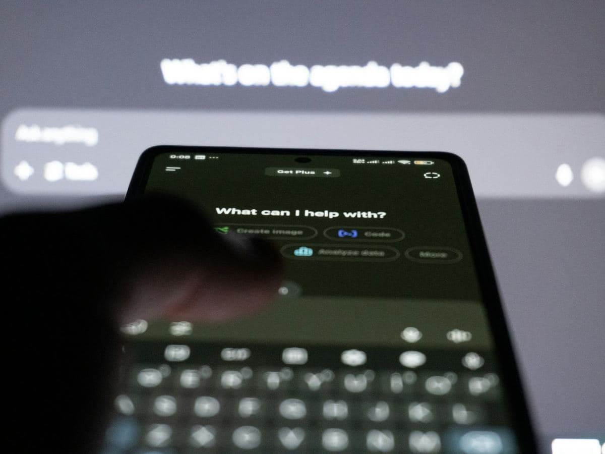Person asking an AI chatbot a question on a smartphone