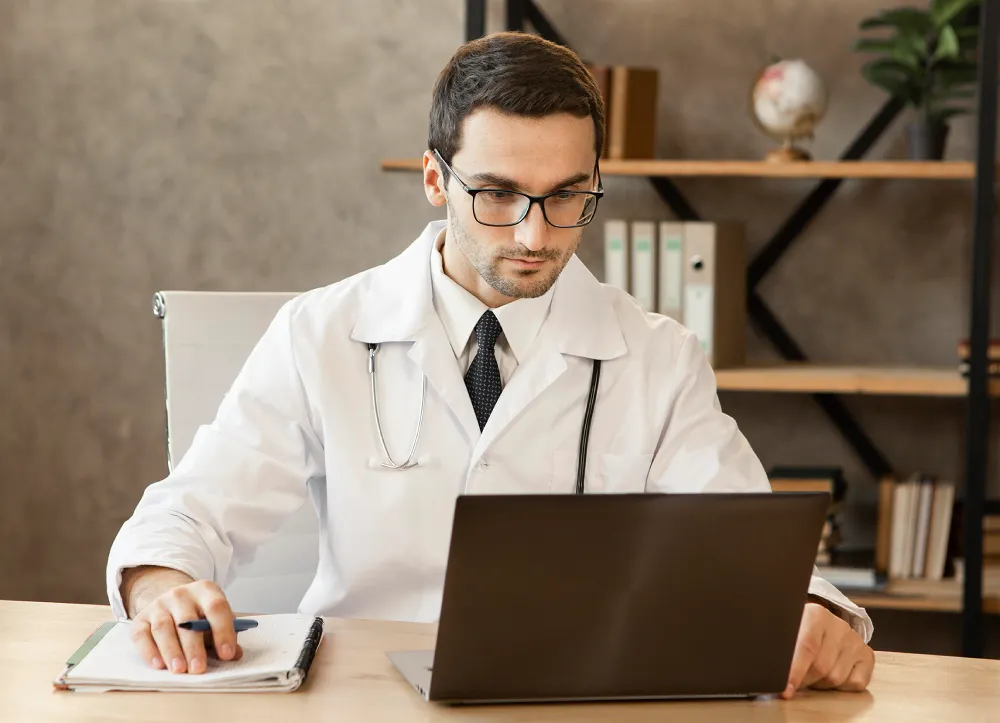 Doctor reviewing analytics